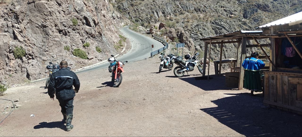 Motorcycles at mountain roadside stop